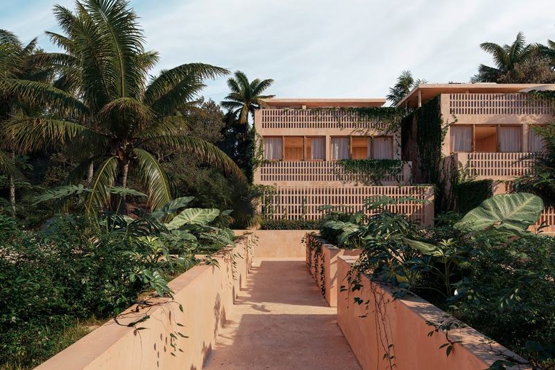 Ahau Gardens: path between the blocks to the main entrance, developer's render