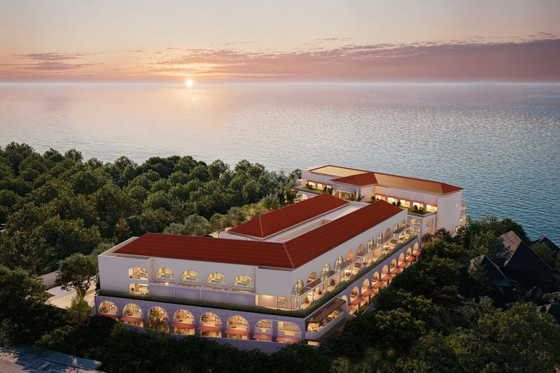 Amali Luxury Residence: the building above the ocean at sunset