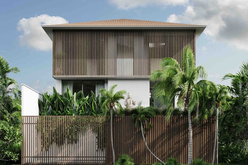 Ocean-view villa in Dreamland, Balangan: timber-slat facade behind the boundary wall