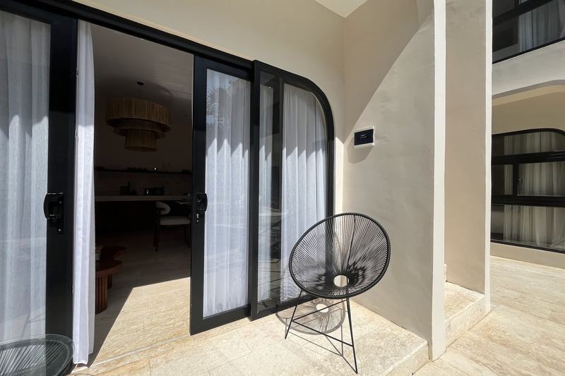 One-bedroom apartment in Bingin: front door off the shared terrace