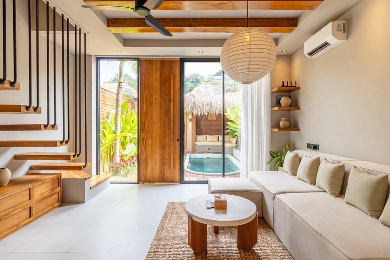 Two-level villa in Bingin: living room opening to the pool