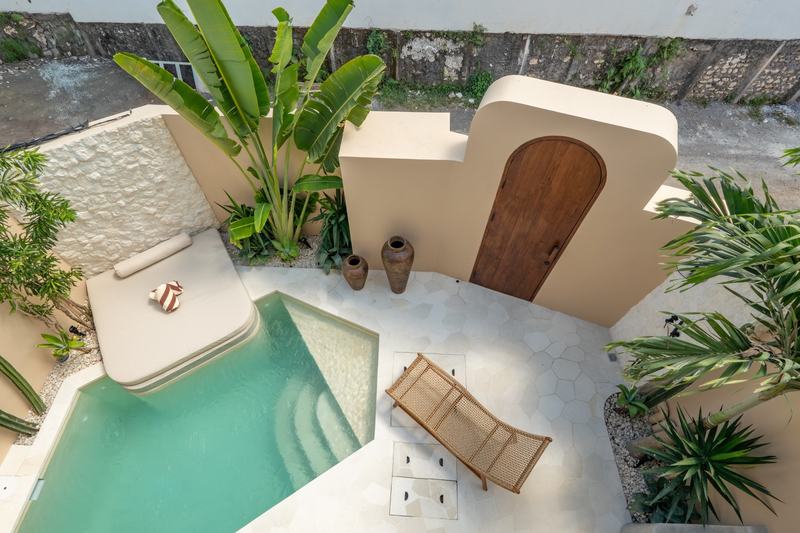 Sand-facade villa, Bingin: pool and courtyard seen from above