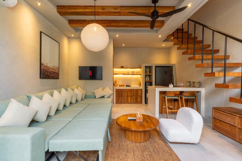 Bingin courtyard villa: sofa beside the staircase