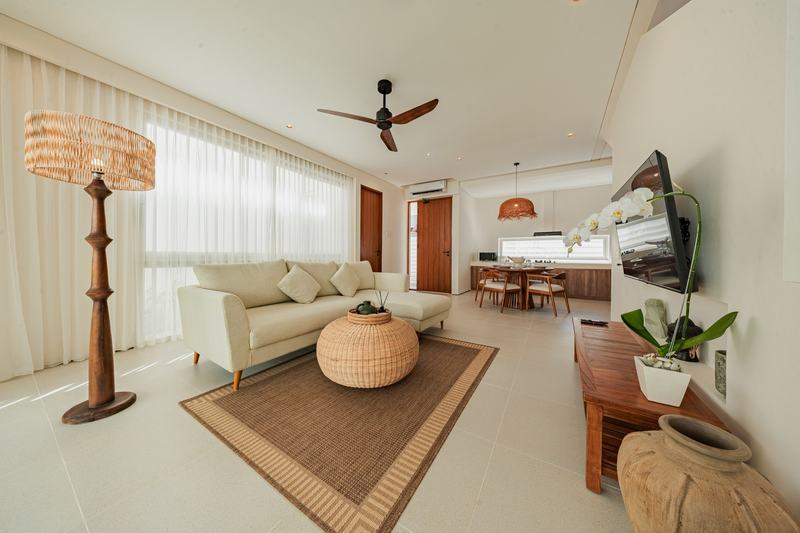 Bingin villa near the beach steps: sofa and floor lamp