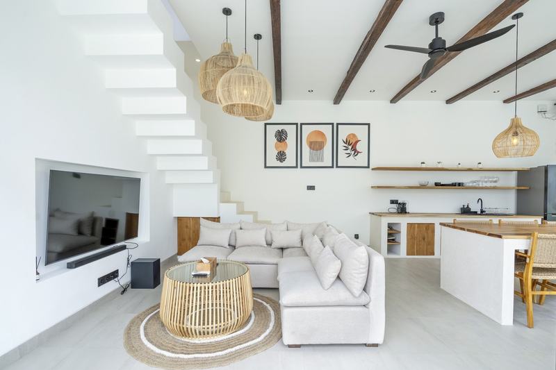 Mediterranean villa in Bingin: living room with stairs and the kitchen