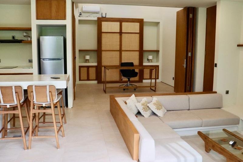 Bingin garden villa, two bedrooms: living area and kitchen with a bar counter