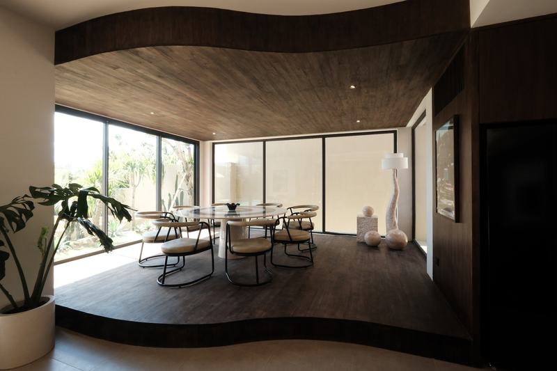 Four-bedroom villa in Bingin: dining room by floor-to-ceiling glass