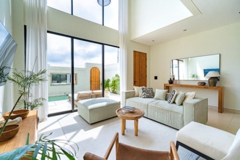 Two-bedroom garden villa in Canggu: living room looking onto the pool
