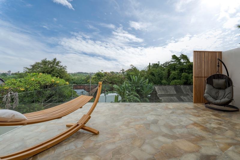 Three-bedroom villa in Padonan, Canggu: roof deck with a hammock