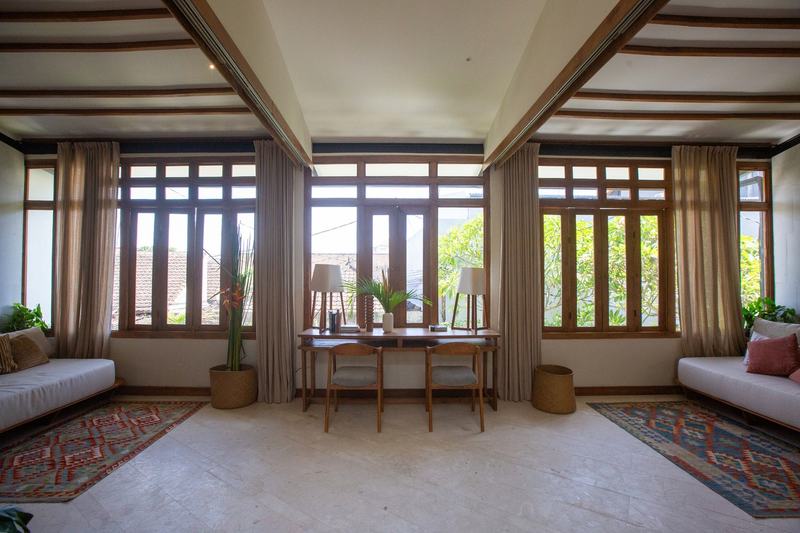 Three-bedroom villa in Canggu: living room with garden windows