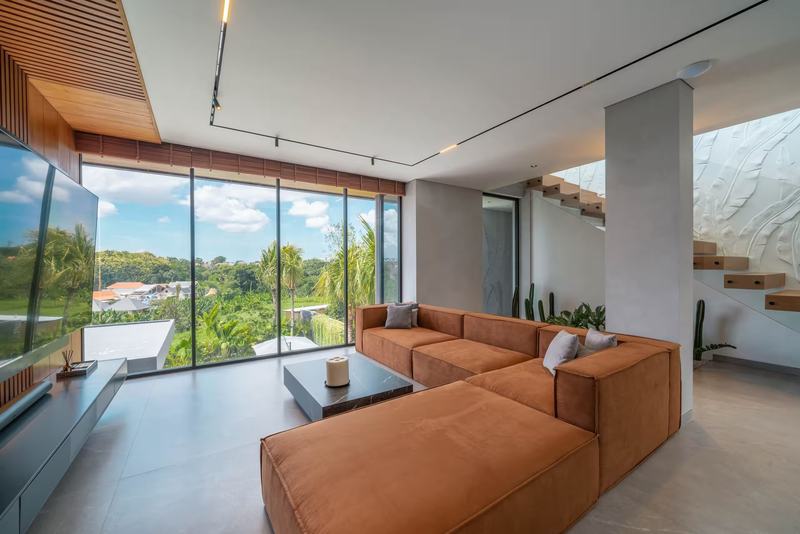 Four-bedroom villa with a rooftop terrace, Canggu: living room with floor-to-ceiling windows