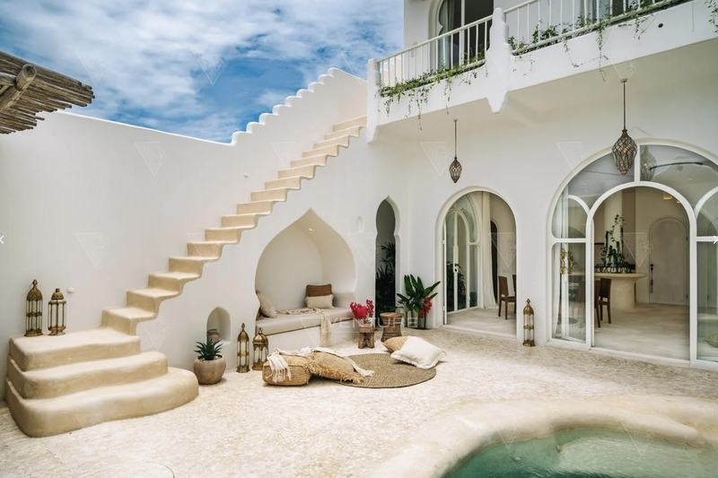 Casa Kayana: roof staircase and a lounge corner by the water