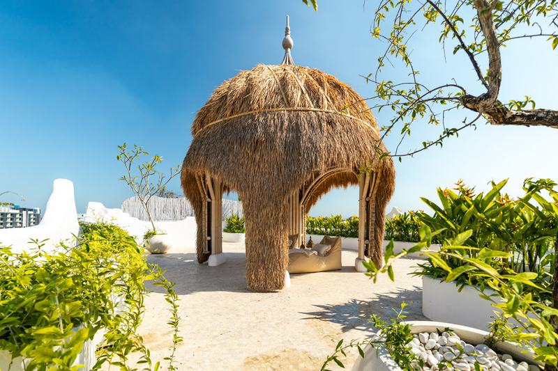 Casa Nostra: roof garden and thatched gazebo