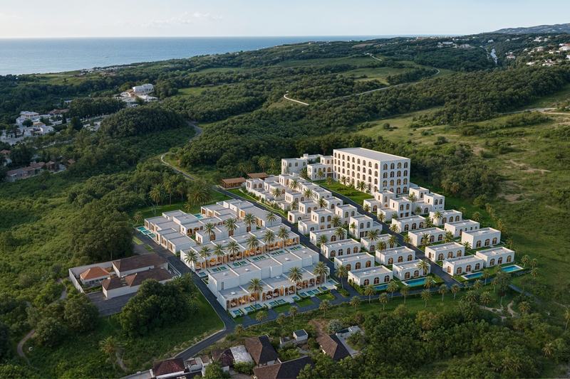 EDEM II: the complex on green hills above the ocean, drone view (render)