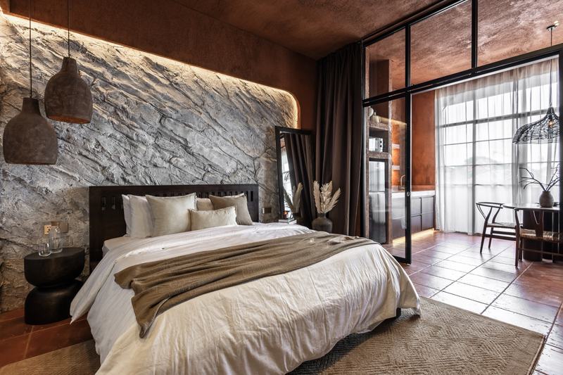 Emy Terra: apartment interior, bedroom behind a glass partition