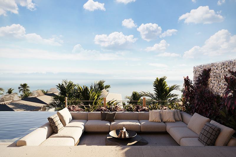 K-Village 2BR villa: terrace sofas with the ocean beyond (render)