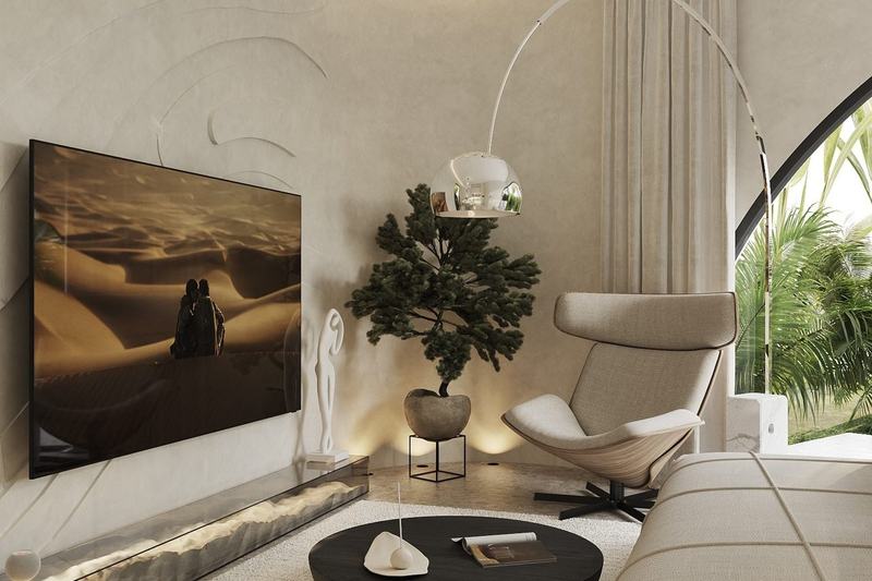 Manta Shell Villa: lounge with a porthole window to the garden