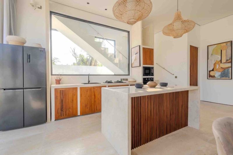 Three-bedroom villa in Melasti: kitchen island and built-in appliances