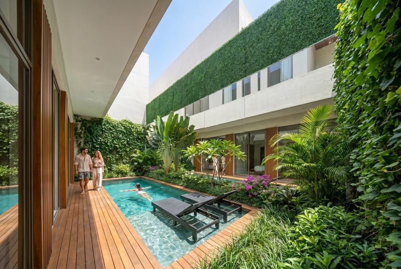 Melasti Villas: pool and timber deck in a villa courtyard, render