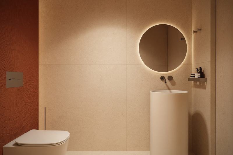 MOONO 1BD Villa: terracotta-toned bathroom and round mirror