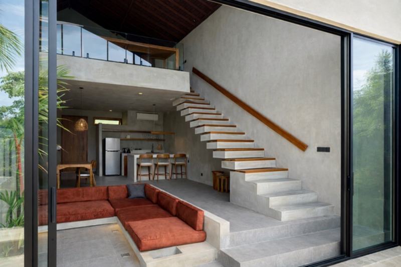 Loft villa near Nyang Nyang: stairs to the upper level above the kitchen