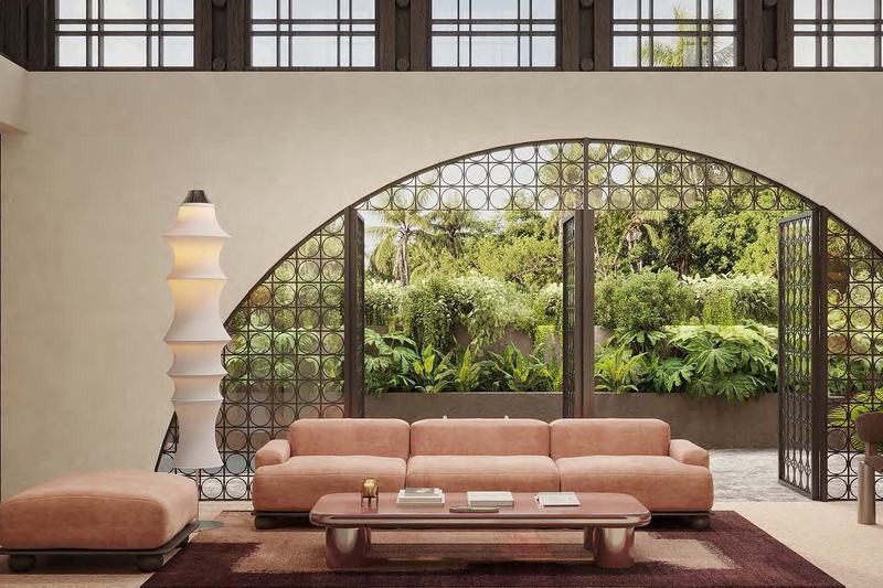 Origins Villa #1: living room under an arch, garden beyond