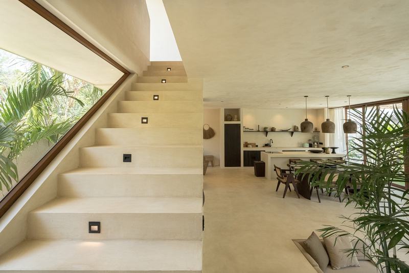 Rooftop villa in Pecatu: staircase beside the kitchen and dining area
