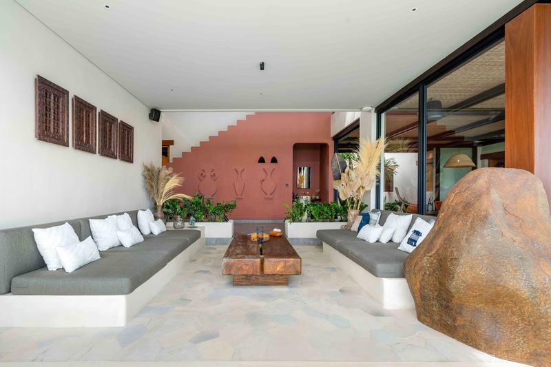 Four-bedroom Pecatu villa: living room built around a boulder