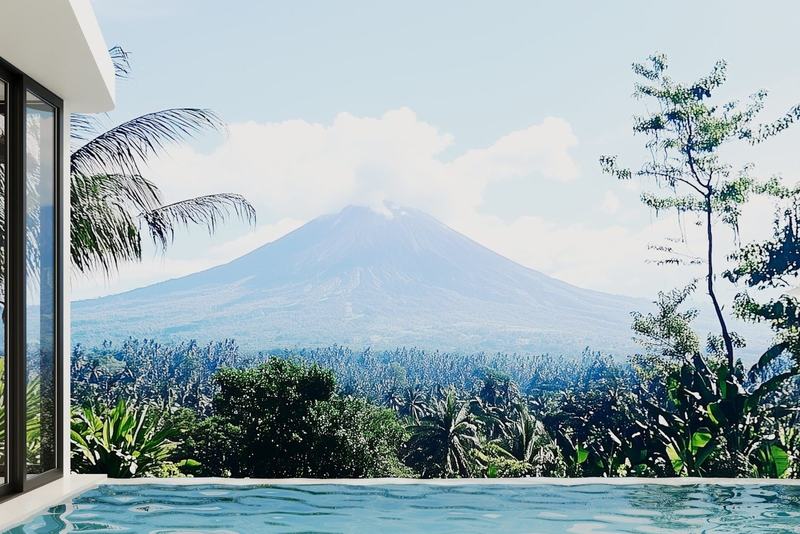 PRANA Virgin Quiet: pool with Mount Agung in the distance, developer's render