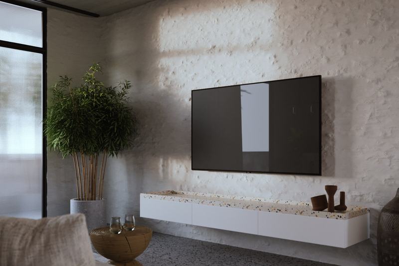 Living room of the 69.5 m² layout, TV on a textured wall, developer's render