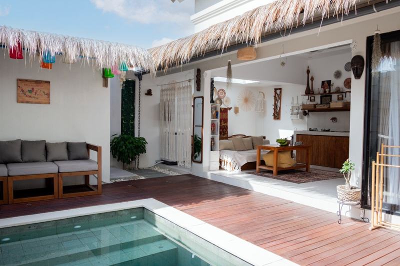 Two-bedroom villa in Seminyak: pool and thatched deck by the living room