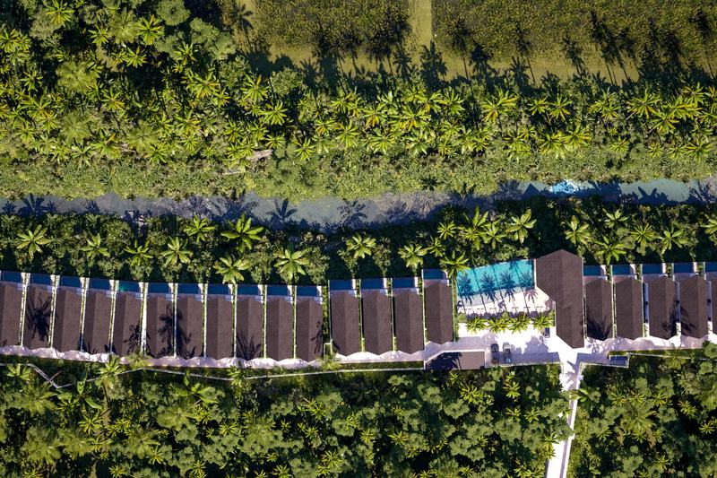Serenity Village: aerial view of villas along the river, render