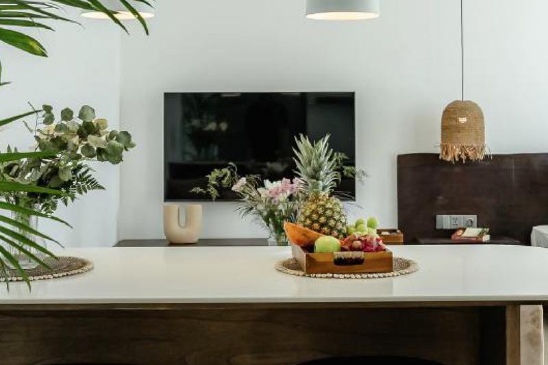 Sunny Aparts II: island counter and stools in the kitchen, developer photo