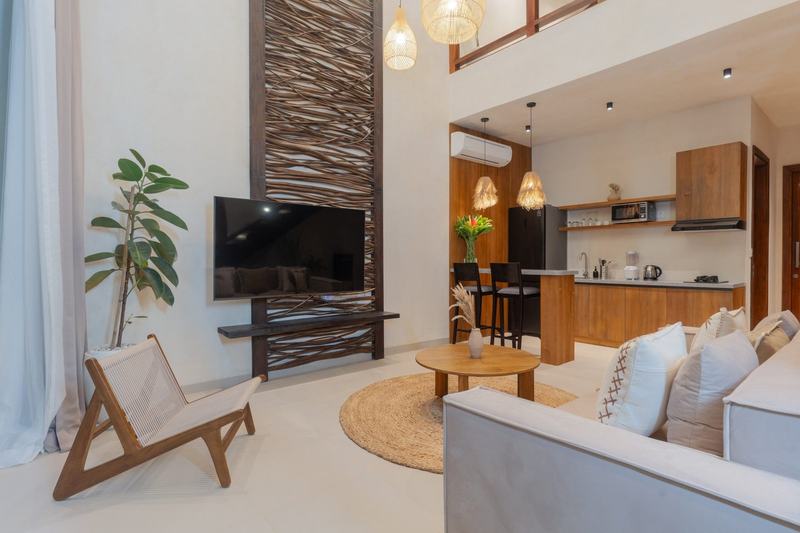 Sunny Cuddles: loft living room under a double-height ceiling, developer photo