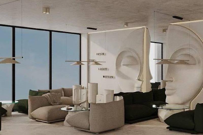 Sunny Muse: lobby with face sculptures and soft seating, developer render
