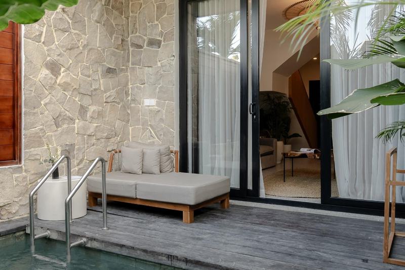Sunny Nine: poolside daybed and sliding doors to the living room, from the developer's presentation