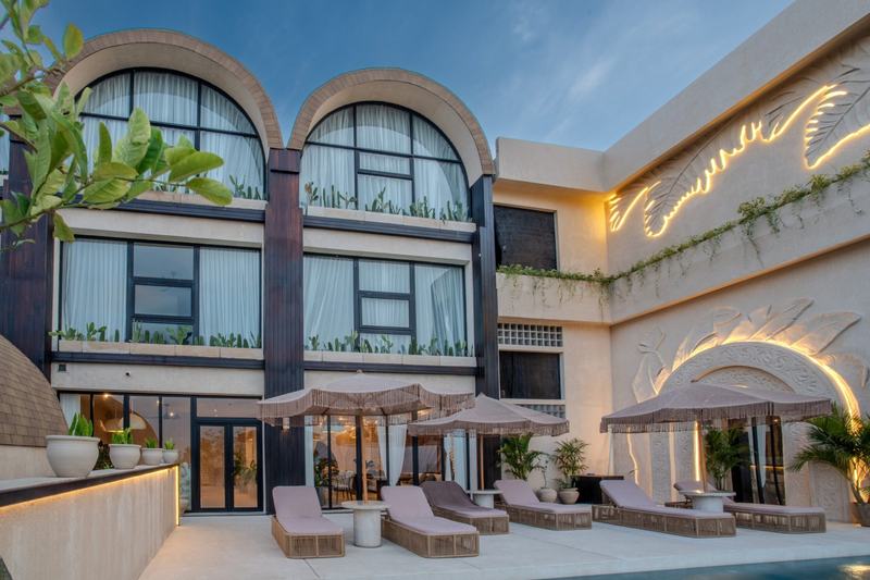 Sunny Samudra: arched facade and poolside loungers, developer photo