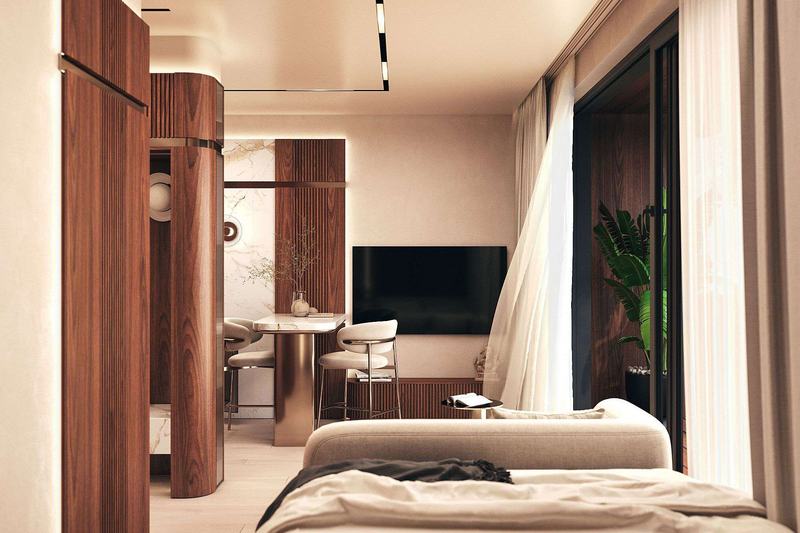 TAO Club House 28 m² studio: bed with a wall-mounted TV