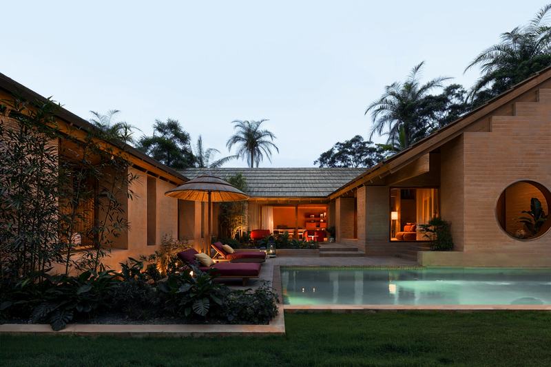 The Pavilions render: courtyard pool of a villa at sunset