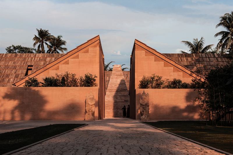 The Pavilions render: driveway between two tiled-roof wings