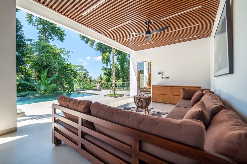 Four-bedroom villa in Ubud: living room beside the pool