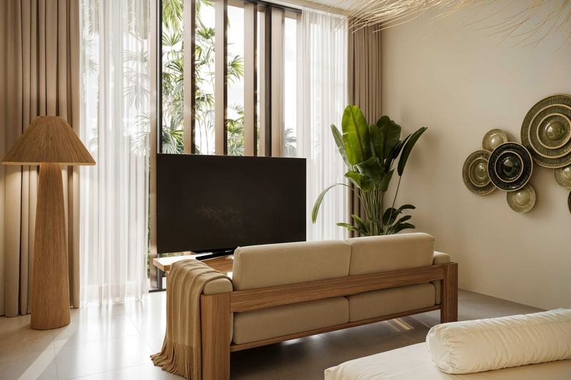 Ubud Dream Apartment 1: sofa and TV next to a big window