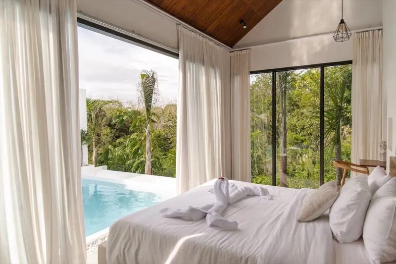 Two-bedroom villa at Nyang Nyang: bedroom looking onto the pool