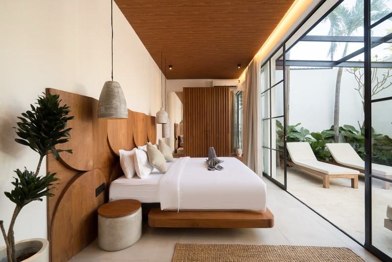 Two-bedroom villa near Nyang Nyang Beach: bedroom that steps out to the pool