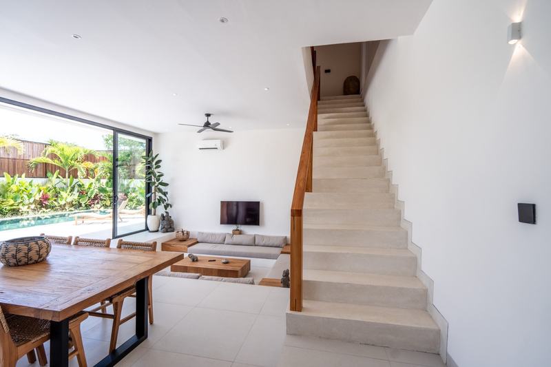 Three-bedroom villa in Nyang Nyang: living room and staircase