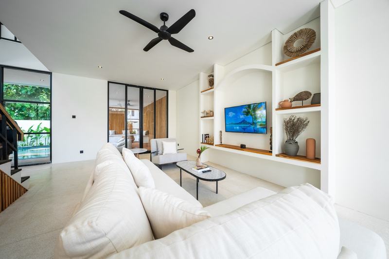 Three-bedroom villa in Nunggalan, Uluwatu: living room and staircase