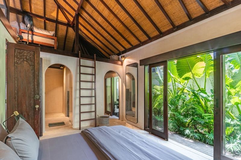 Boutique villa in Nyang Nyang: bedroom opening to the garden