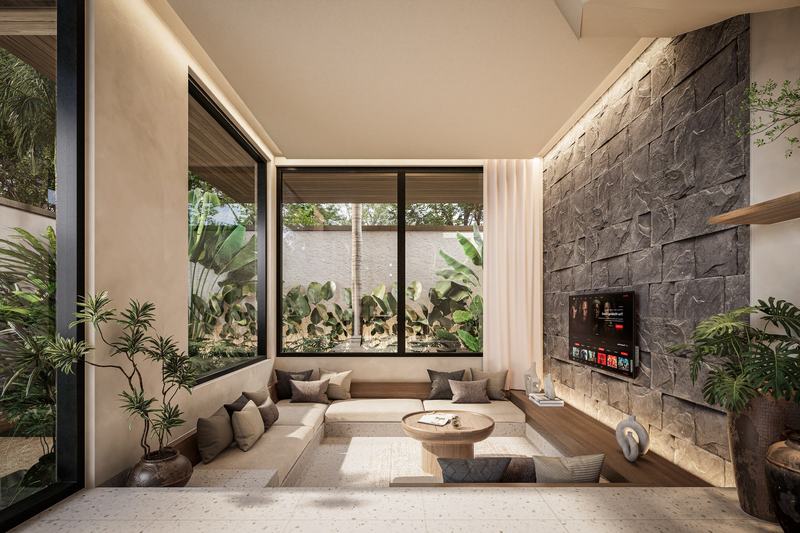 Vasana: living area glazed toward the garden