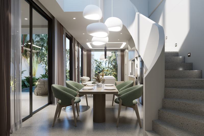 Zamaya: dining table at the foot of the stairs