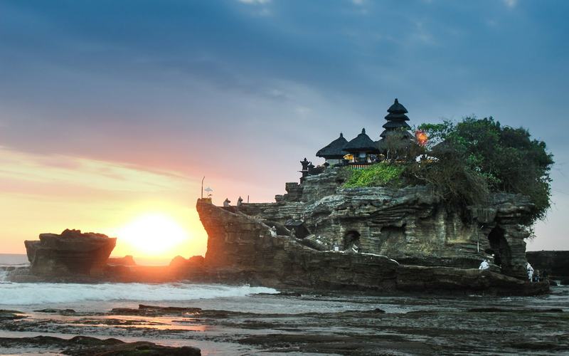 Tanah Lot temple on its rock at sunset